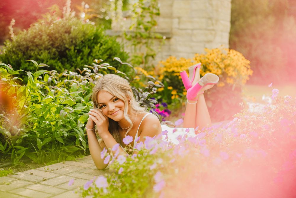 Artistic garden photography with soft pink bokeh effects and natural lighting.