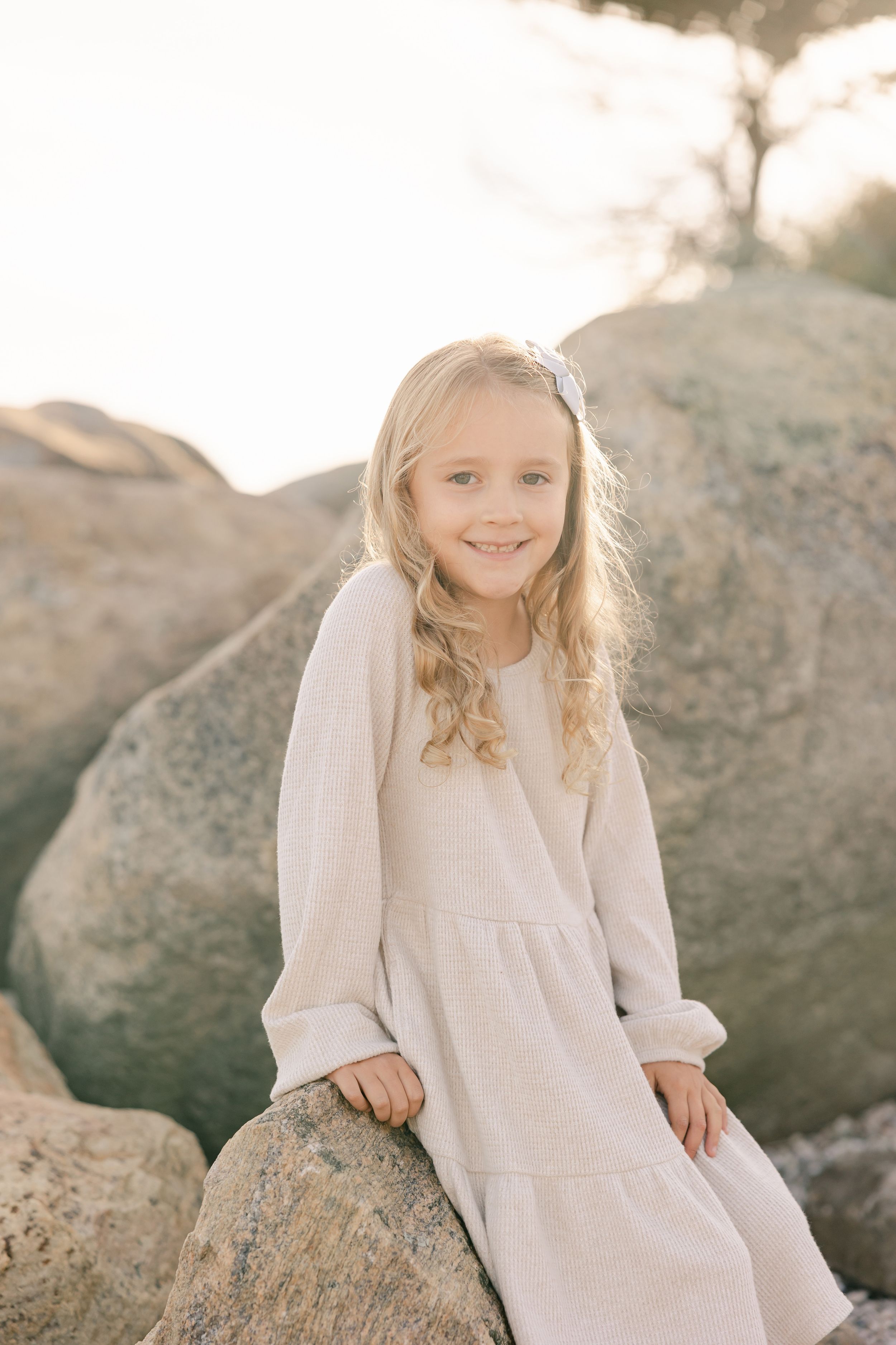 Portrait of girl on the rocks in CT | Connecticut Family Photographer.
