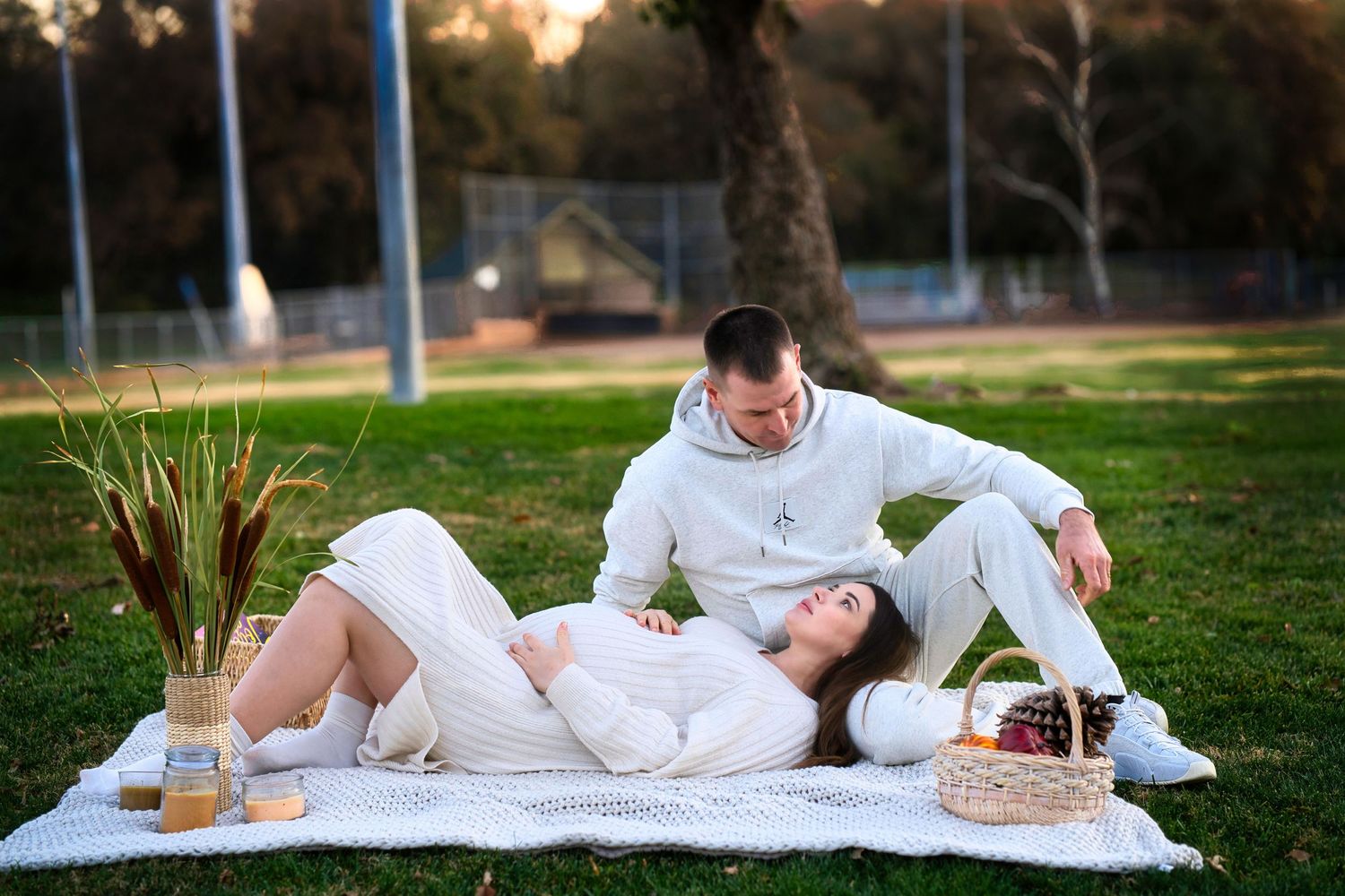 This maternity photo captures the beauty and anticipation of pregnancy in a peaceful, natural environment.