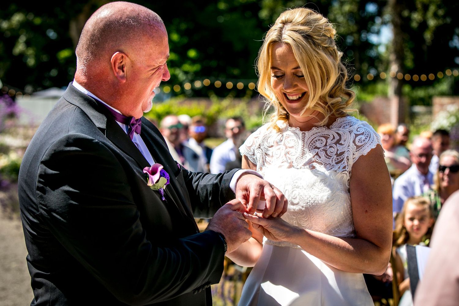 Joyful wedding celebration moments captured in an outdoor garden setting.