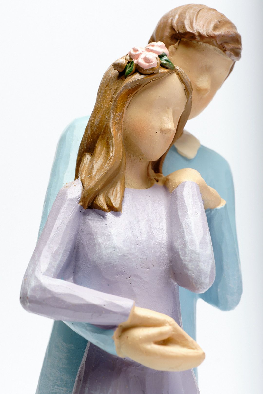 Amazon Sellers close-up detail of a ceramic figure "Two Become One".