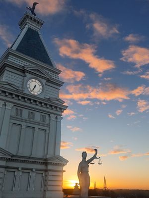 Lady Justice at Clarksville TN Courthouse at sunrise by drone Raw Element Productions