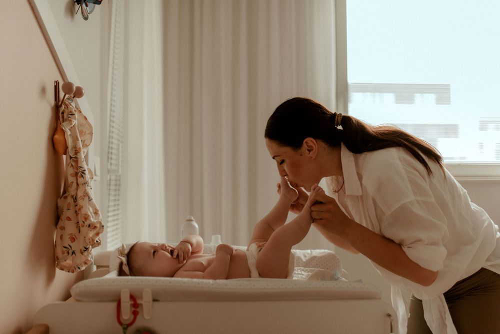Lifestyle photography session capturing sweet moments between parents and their young child.