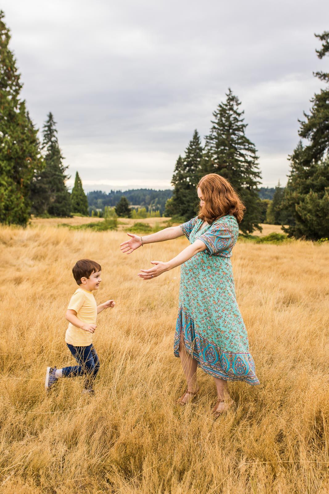 Candid photo of son running to hug his mother