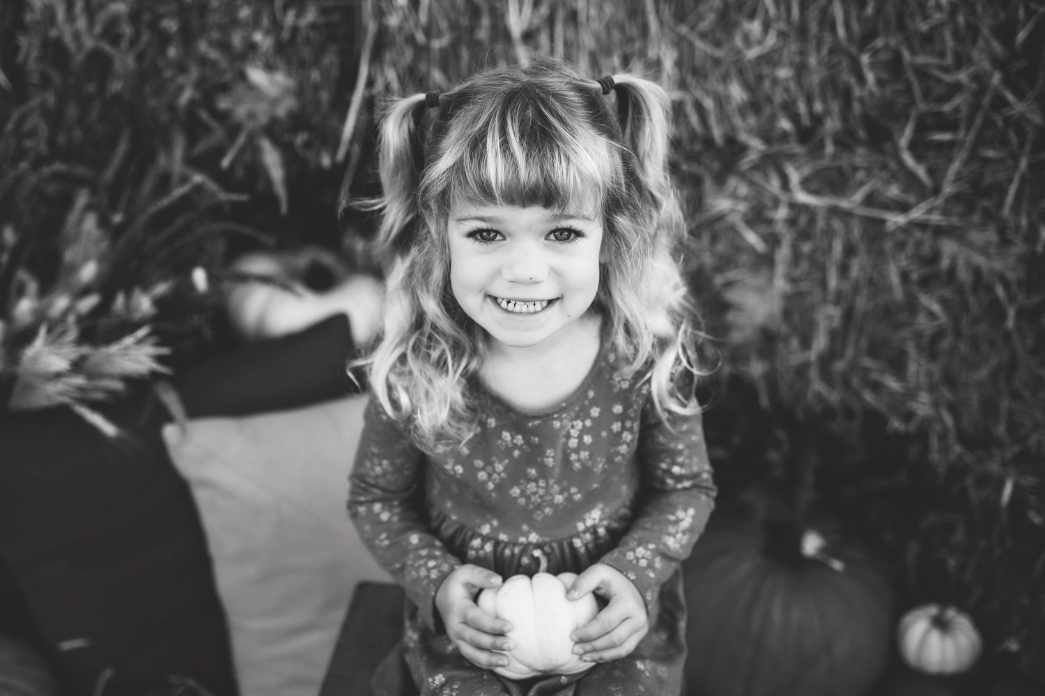 Black and white portrait series with autumn decorative elements.