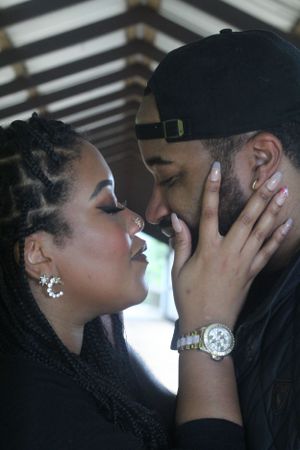 Intimate close-up portrait of couple sharing tender moment.
