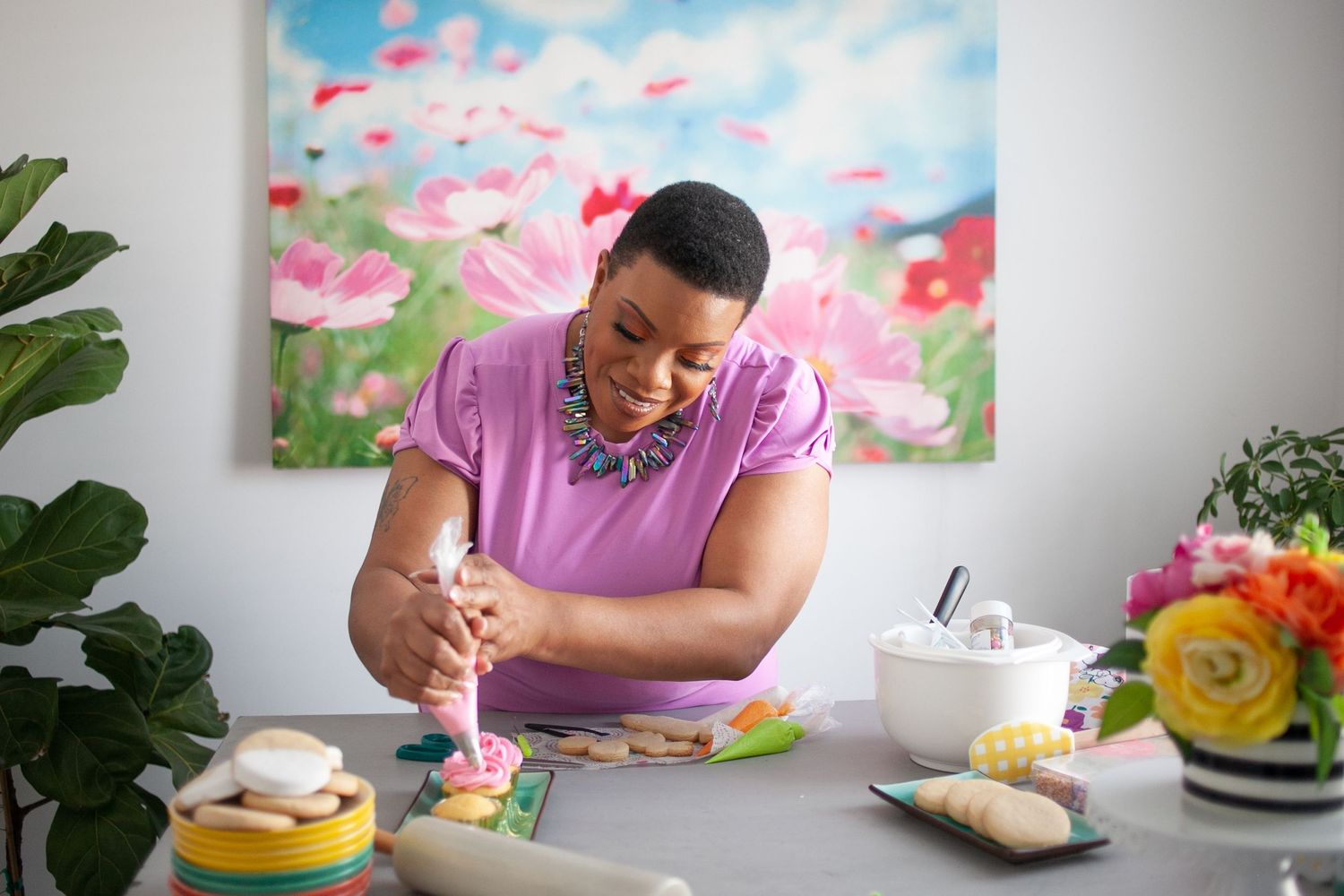 personal branding image of a baker decorating cupcakes