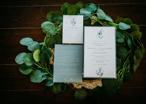 wedding flat lay with greenery