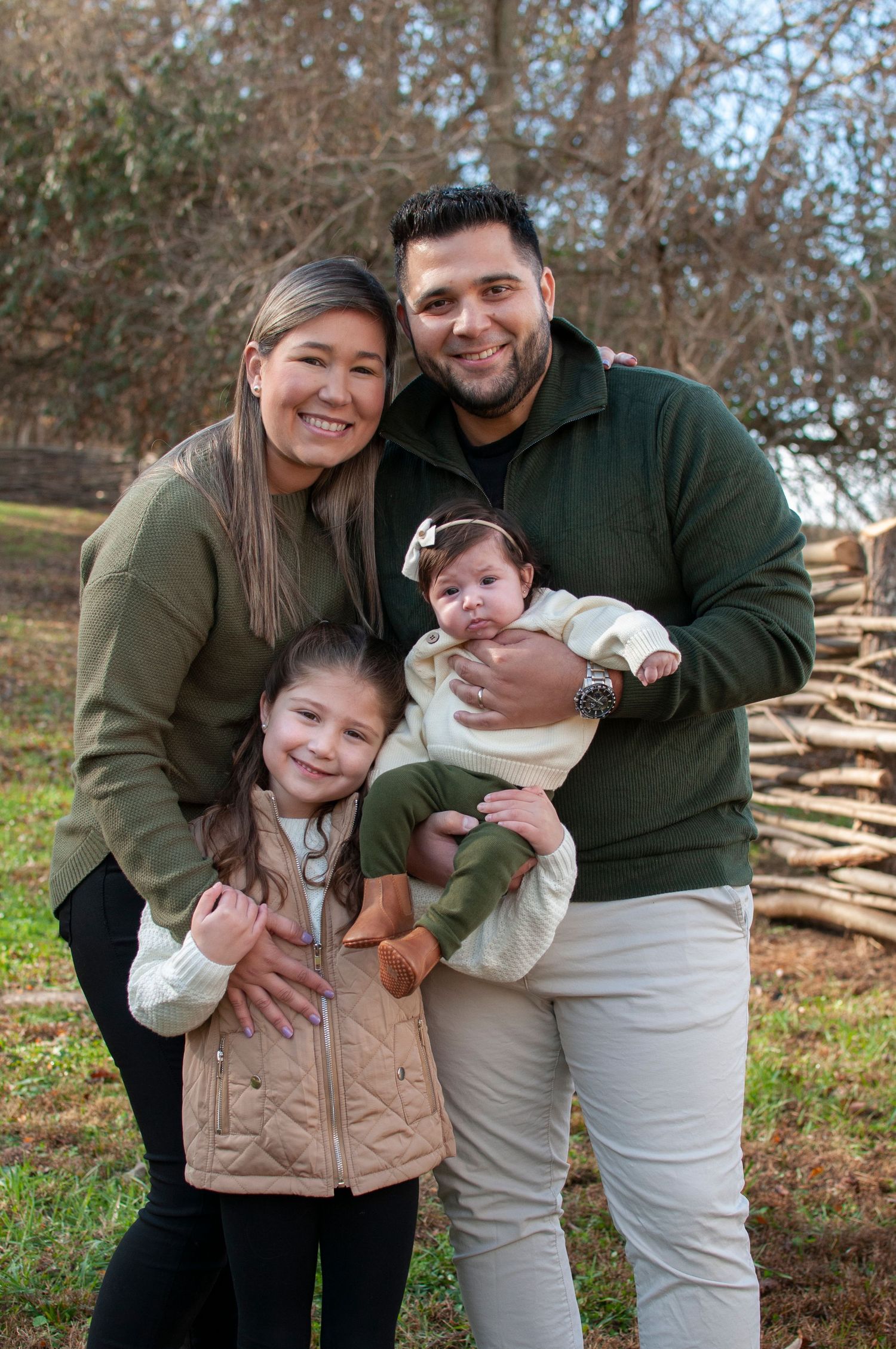 Family hugging outdoor fall photo Short Hill Springs