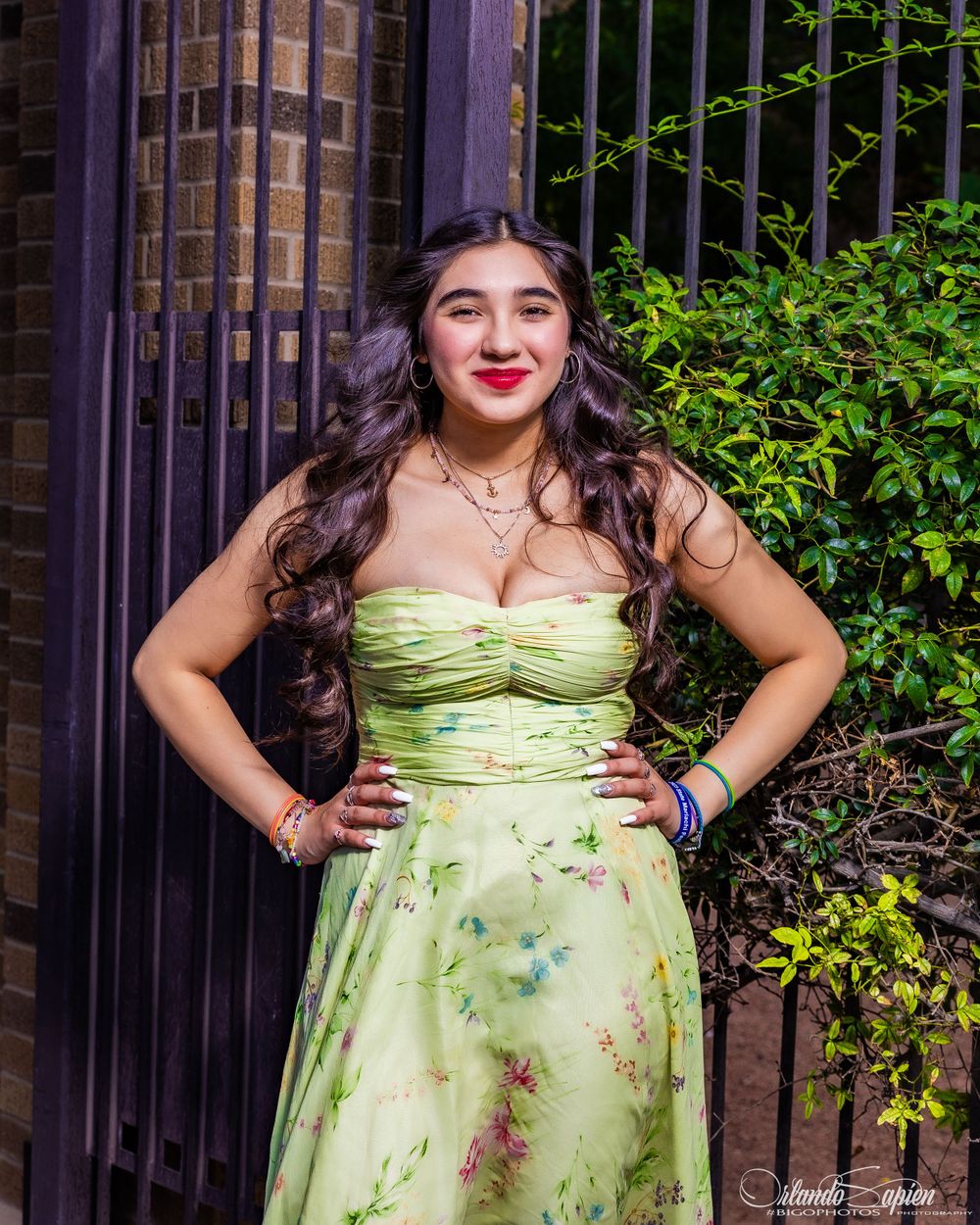 Stylish portrait poses in a sweetheart neckline lime green floral dress.