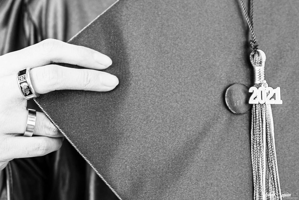 Grayscale close-up shots of graduation cap and tassel details.
