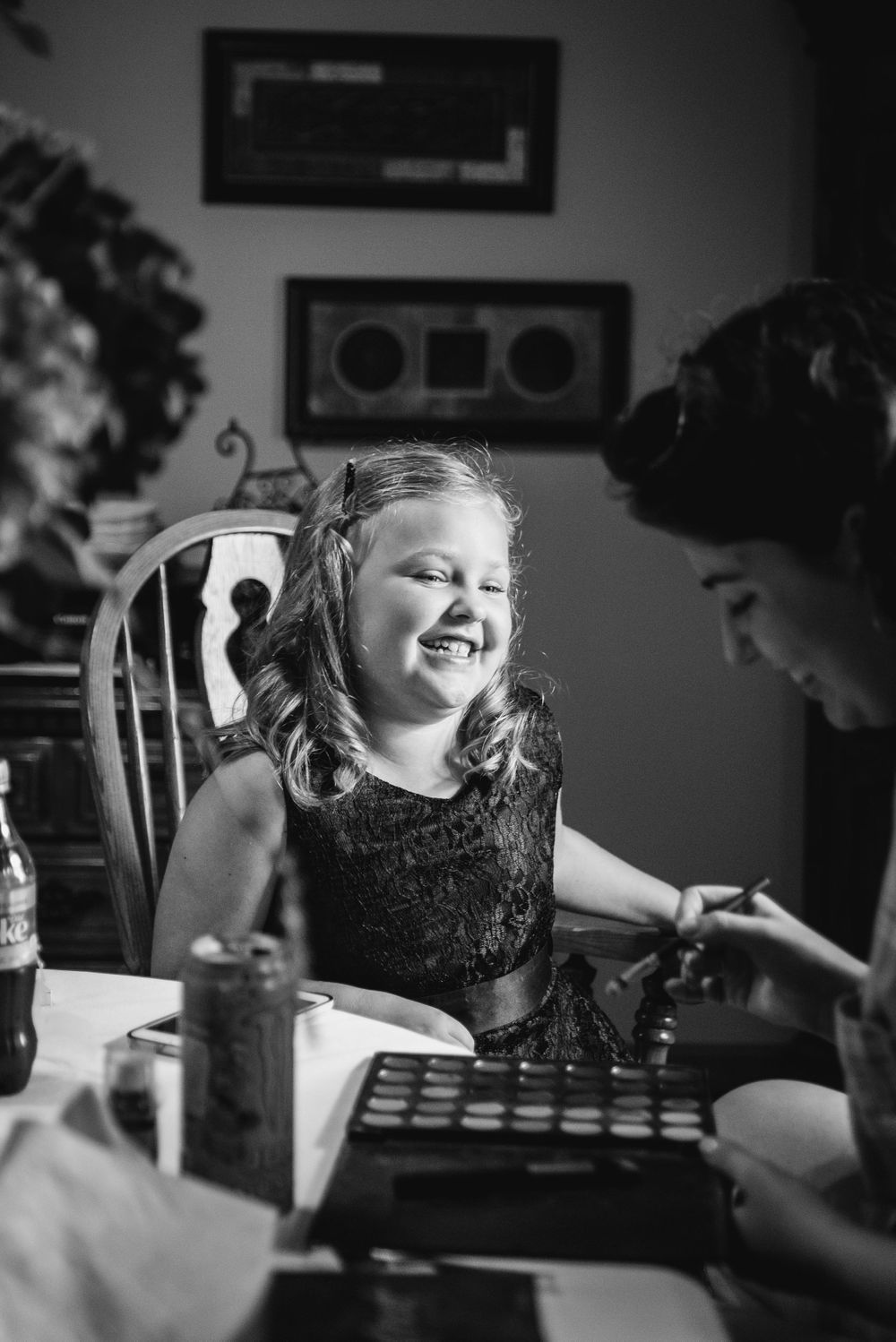 Kid gets her makeup done for a wedding in Indiana.