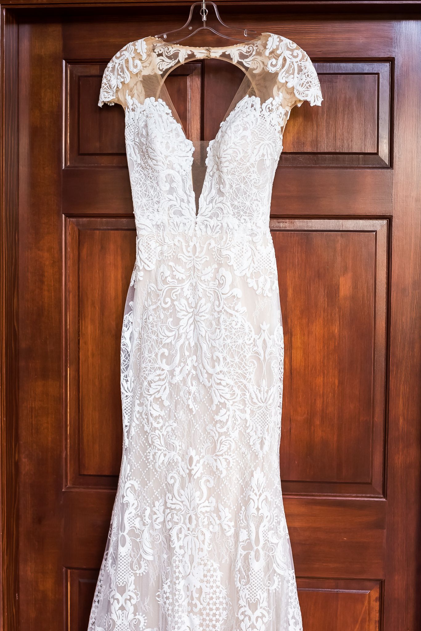 A beautiful lace wedding dress. Photo taken by Vancouver wedding photographer, Kari Mills Photography.