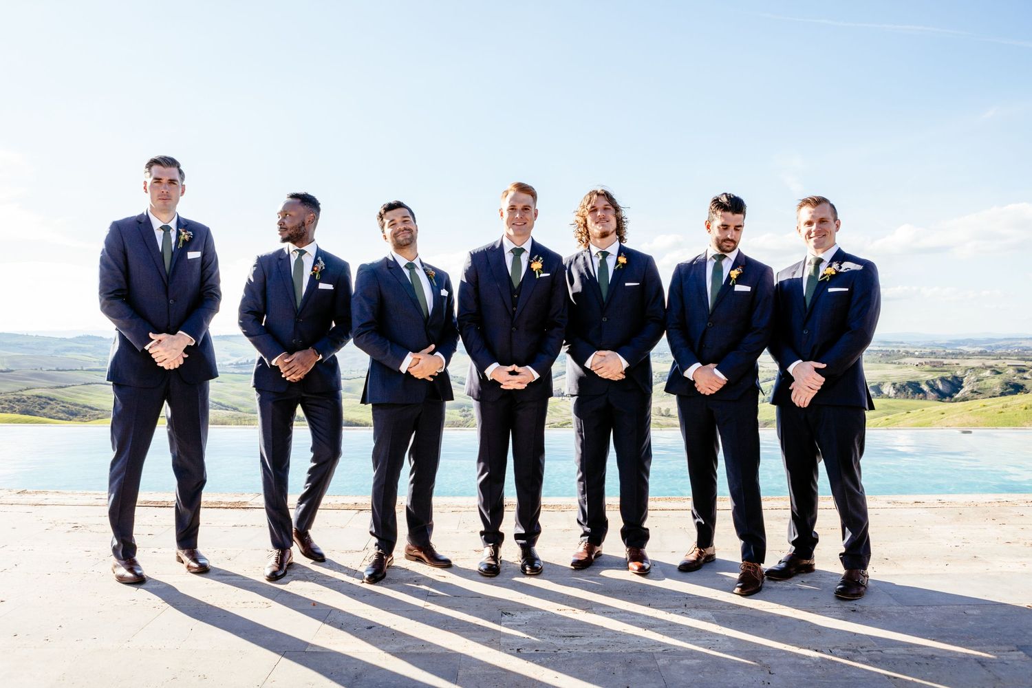 Group photograph of the groomsmen at The Lazy Olive, Podere Finerri, Asciano, Siena.