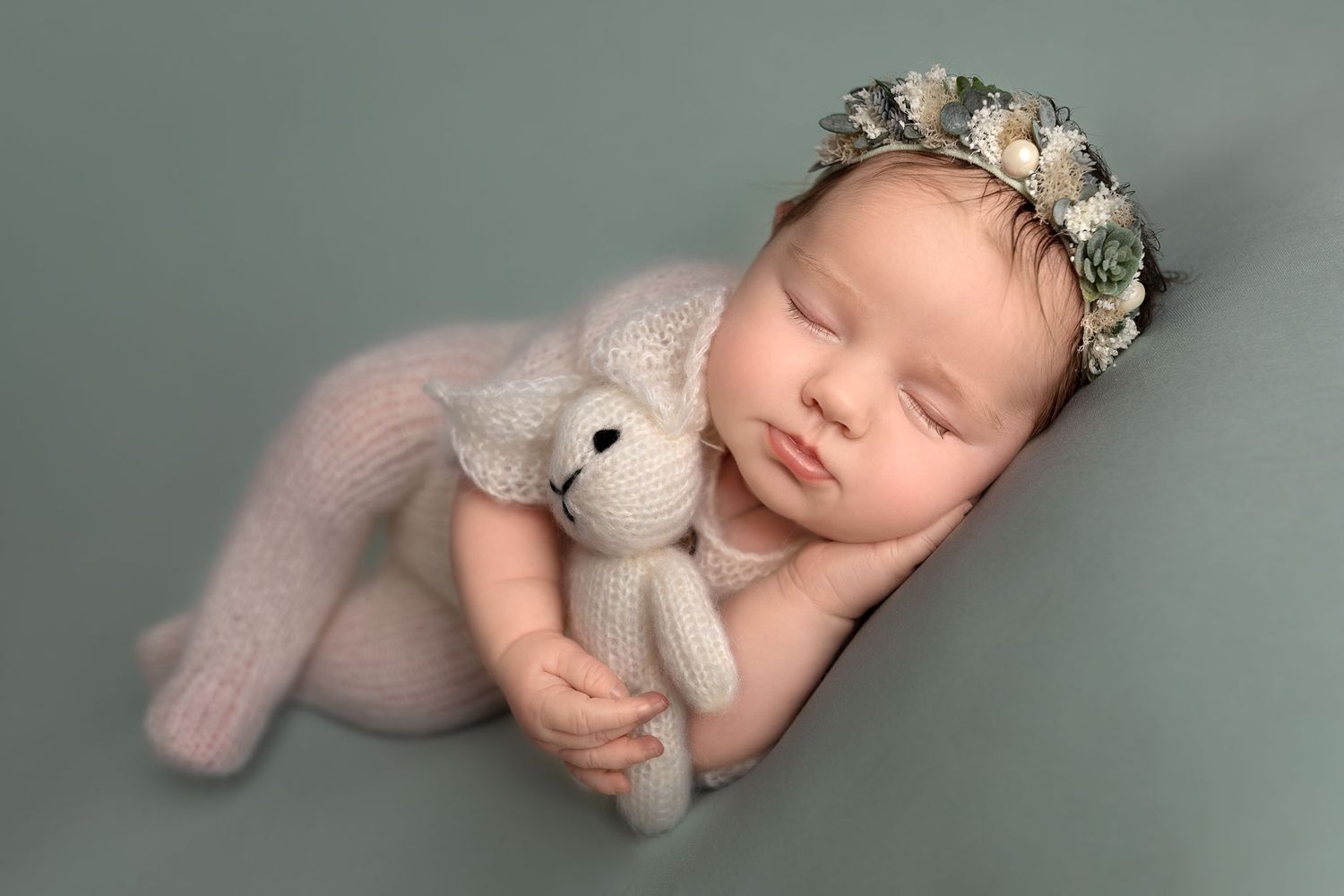 Baby sleeping in side lying position holding a teddy. Monica Bliss Photography in Apex, NC. Newborn, Maternity