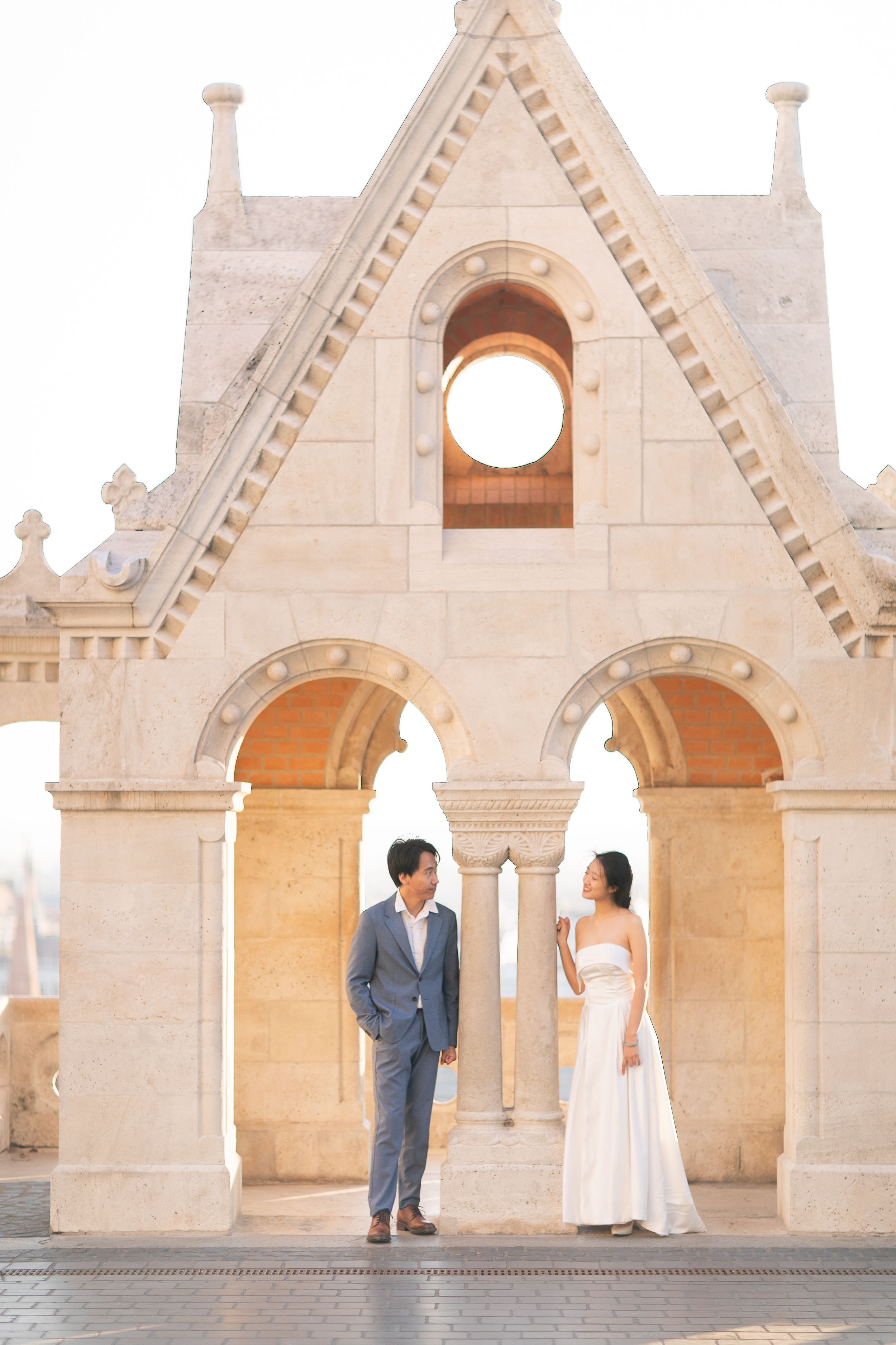 bride-and-groom-at-fishermans-bastion-in-budapest-destination-wedding-with-cityscape-and-romantic-light.jpg