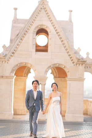 bride-and-groom-at-fishermans-bastion-in-budapest-destination-wedding-with-cityscape-and-romantic-light.jpg