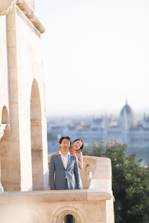 bride-and-groom-at-fishermans-bastion-in-budapest-destination-wedding-with-cityscape-and-romantic-light.jpg