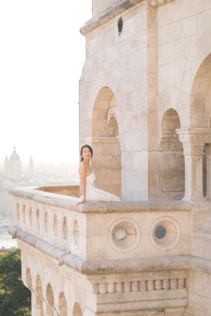 bride-and-groom-at-fishermans-bastion-in-budapest-destination-wedding-with-cityscape-and-romantic-light.jpg