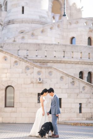 bride-and-groom-at-fishermans-bastion-in-budapest-destination-wedding-with-cityscape-and-romantic-light.jpg
