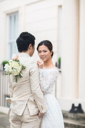 asian-couple-wedding-in-budapest-destination-ceremony-with-historic-architecture-and-city-view-hungary.jpg