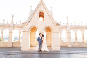 bride-and-groom-at-fishermans-bastion-in-budapest-destination-wedding-with-cityscape-and-romantic-light.jpg
