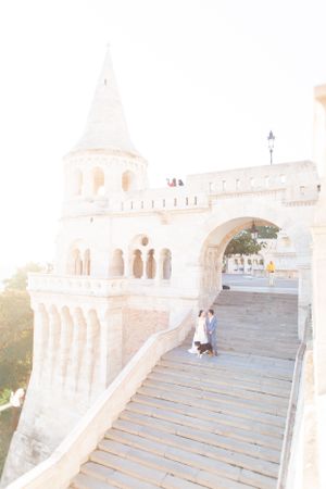 bride-and-groom-at-fishermans-bastion-in-budapest-destination-wedding-with-cityscape-and-romantic-light.jpg