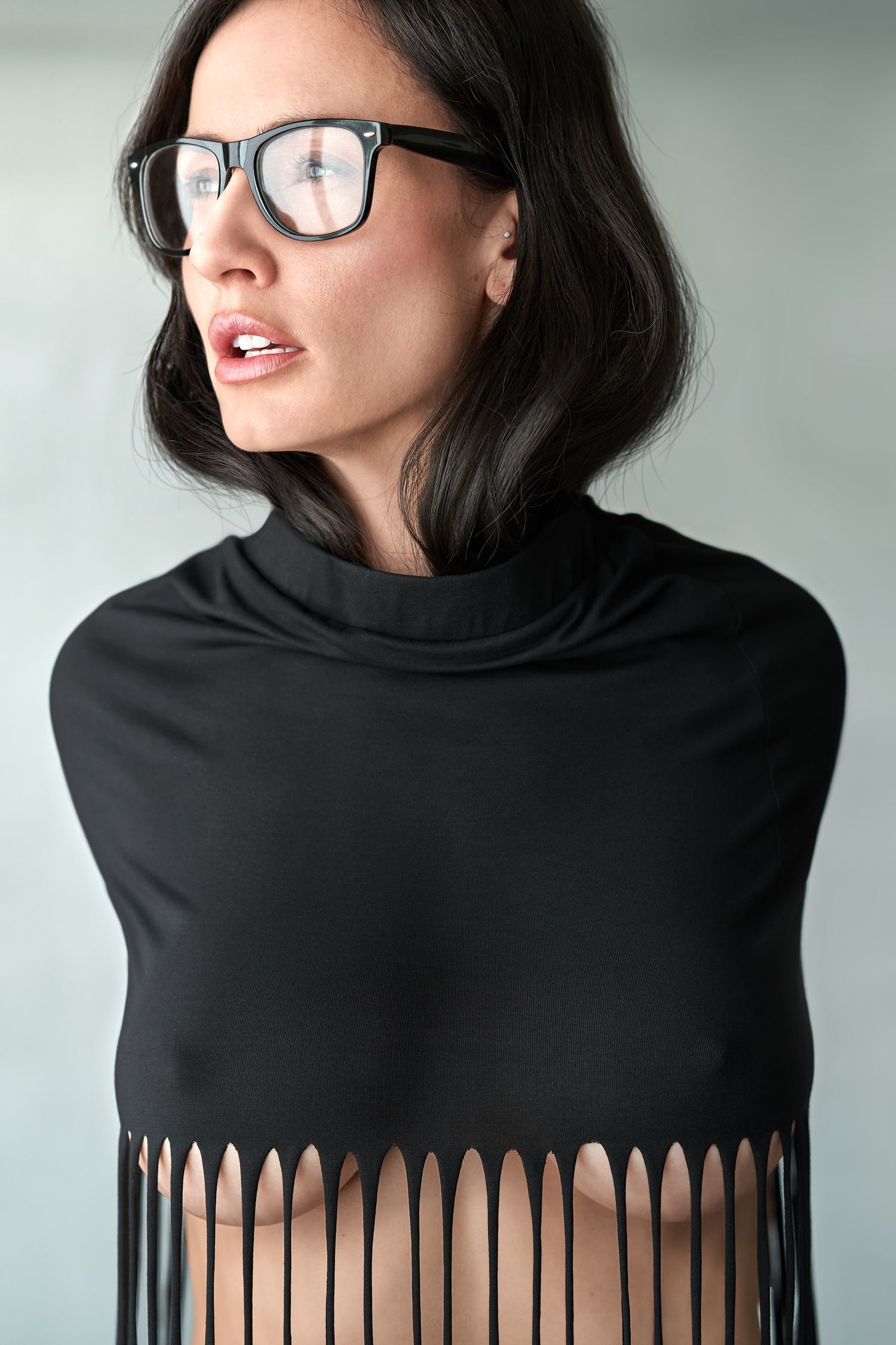 beautiful woman in glasses and fashionable crop top