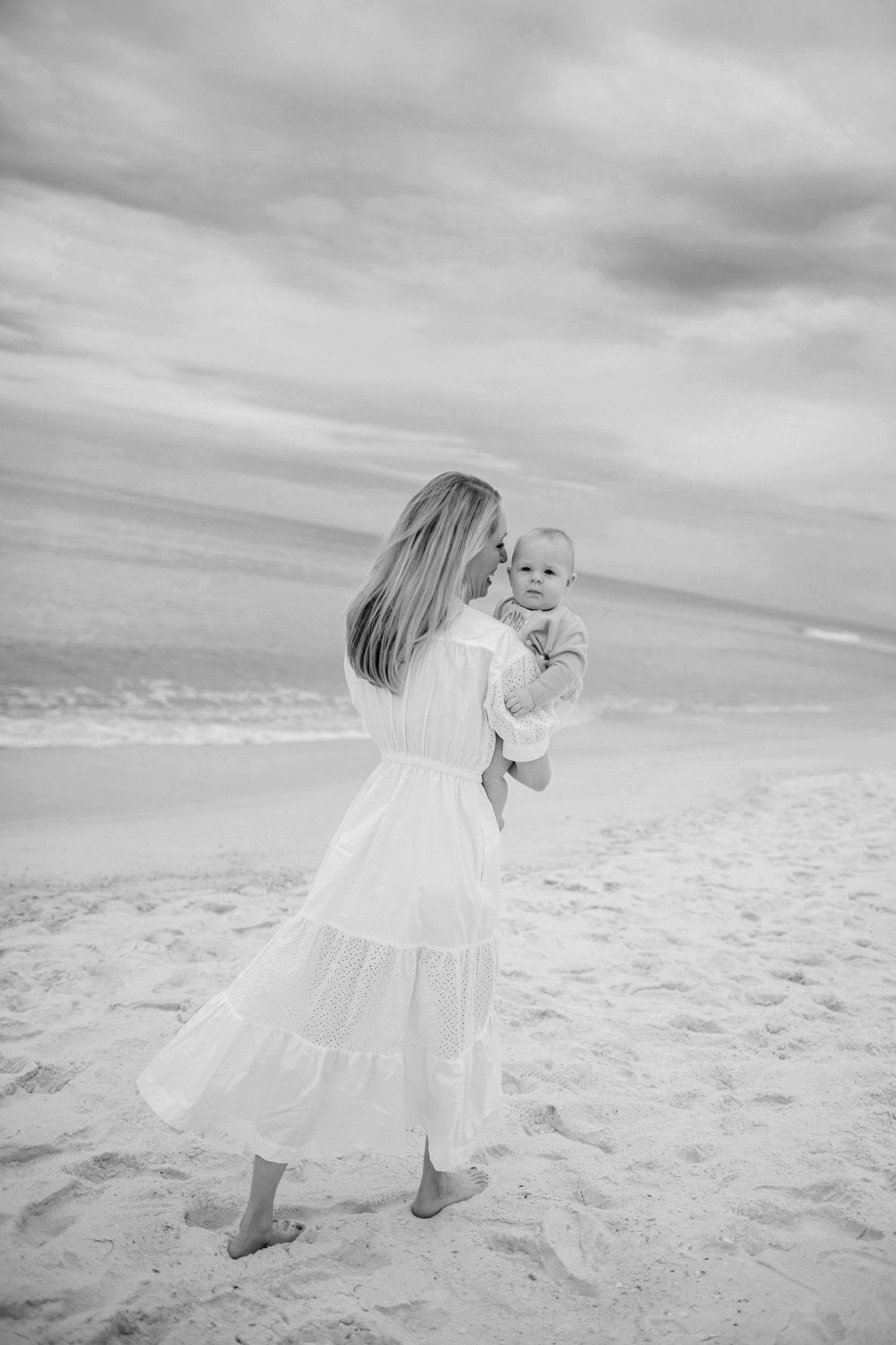 a mum holding her baby in Inlet Beach florida