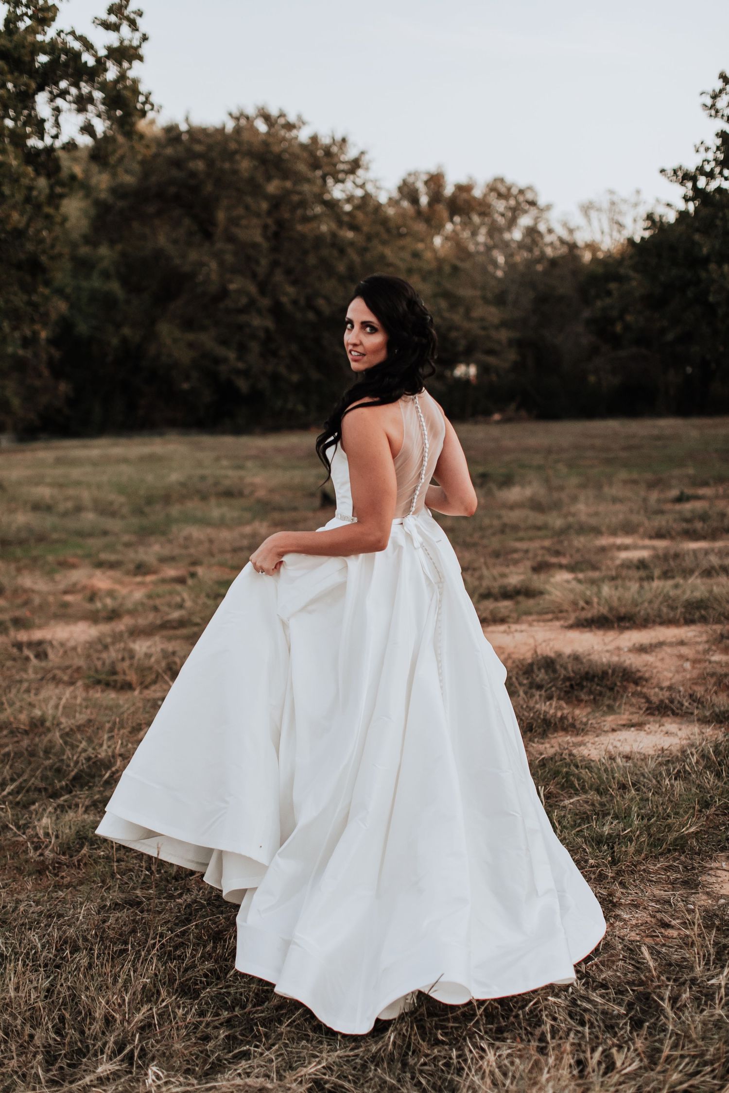 Bride in bridal dress photography at wedding in Dallas TX photographer