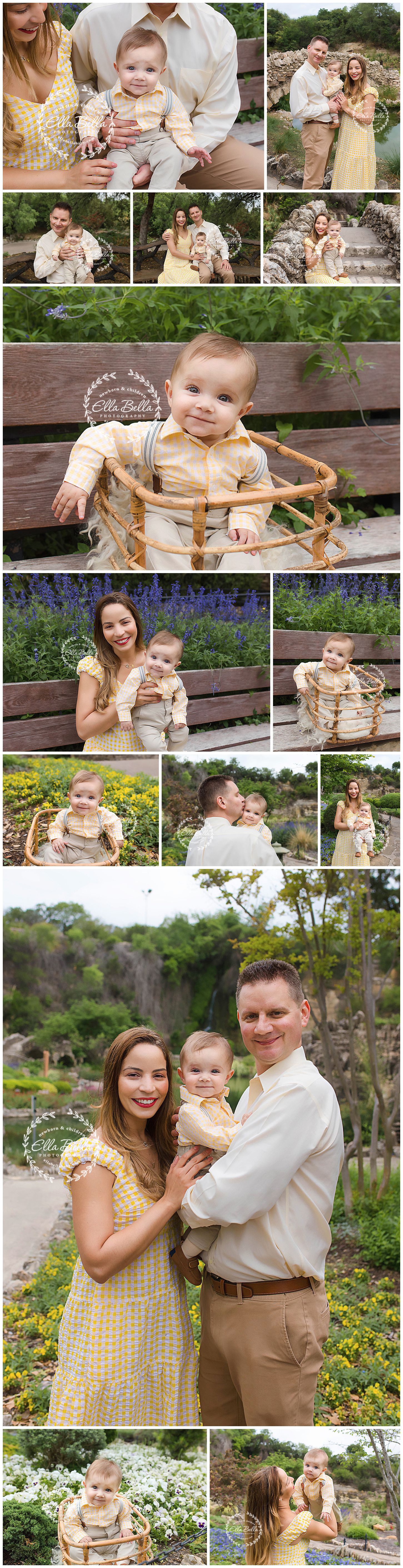 A family photo session in a garden with a mom in yellow dress and dad in light colored clothing with their baby.