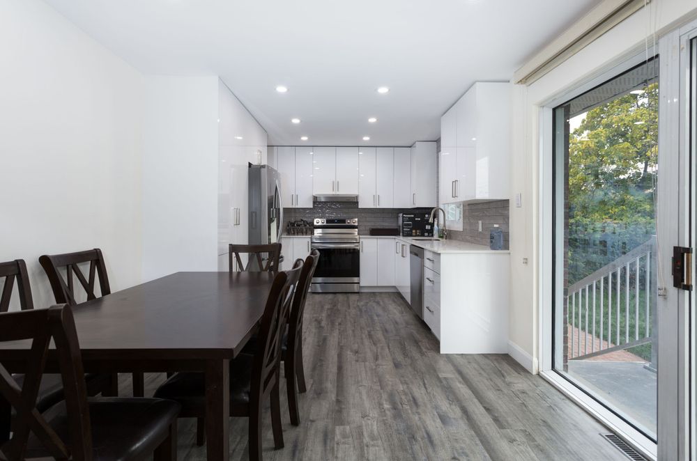 beautiful, modern kitchen with stainless steel appliances. Taken by professional real estate photographer.