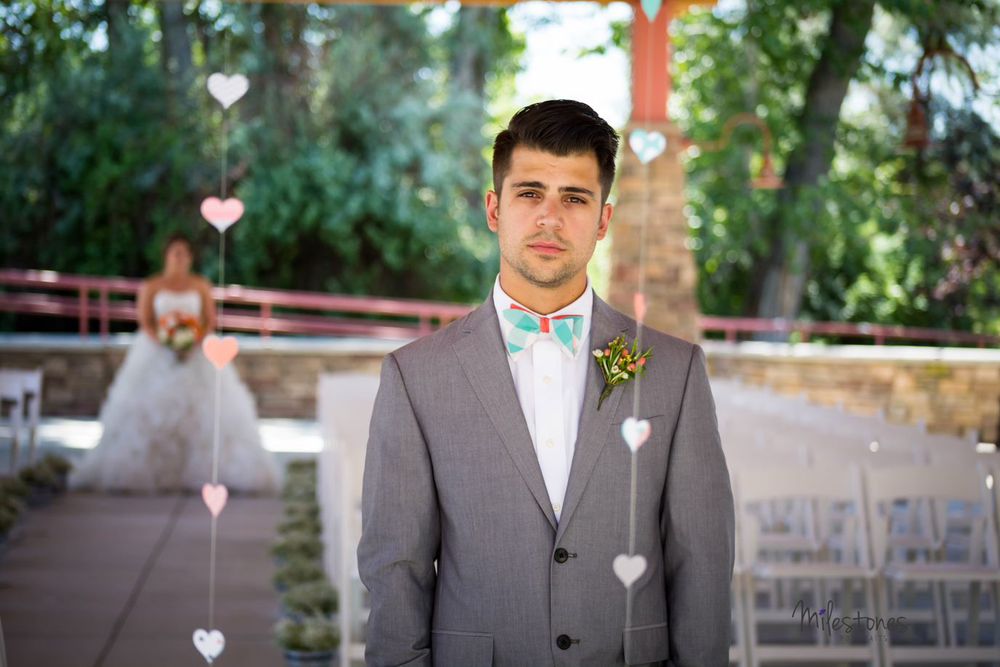 focus on groom for first look