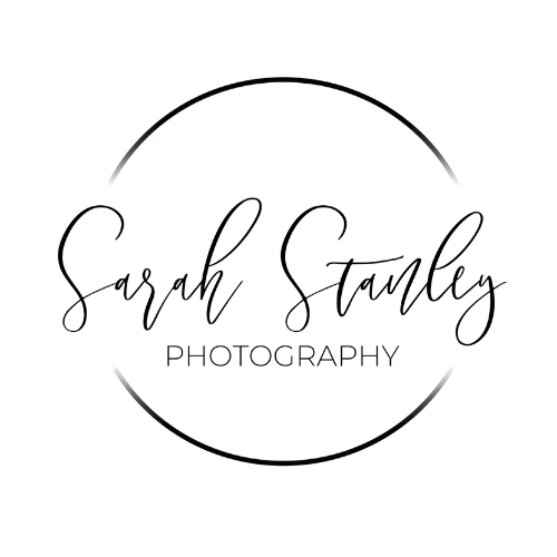 Elegant script photography logo design in black and white.