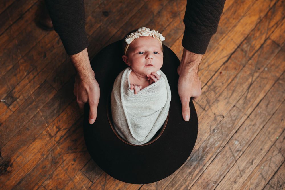 baby in cowboy hat