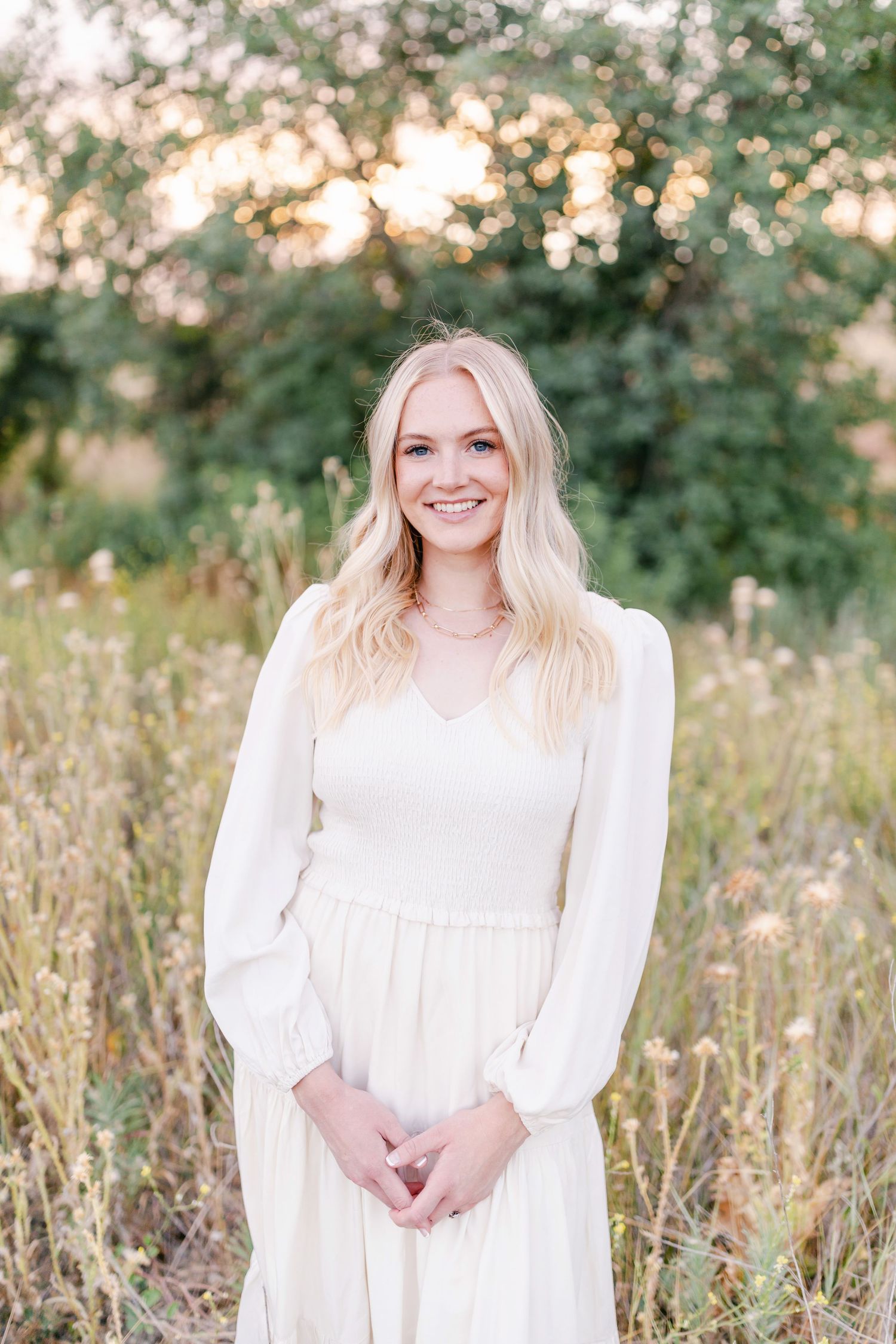 Sweet front white dress pose Captured by Chelsee Rawe Photography