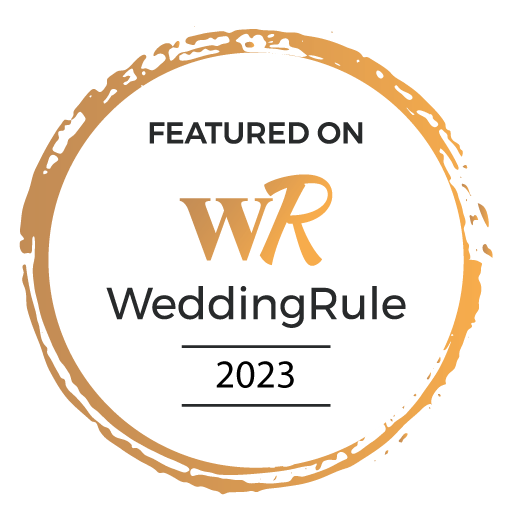 Orange circular badges featuring WeddingRule branding and 2023 text.