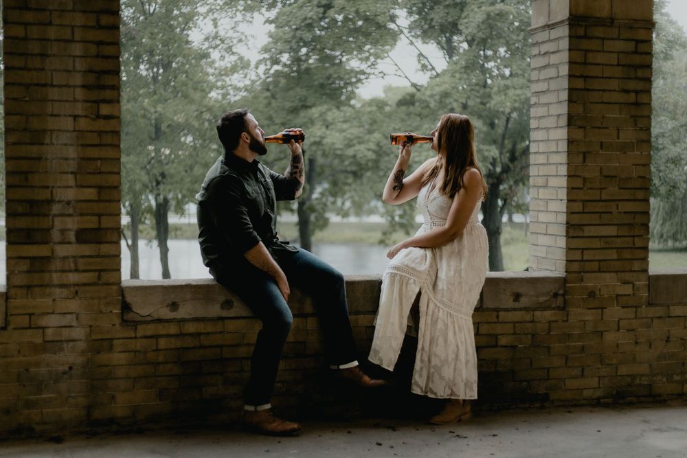 Elopement or engagement couple in Detroit Michigan with beer
