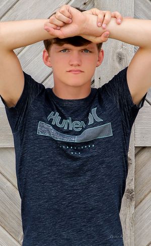 becky katzberg photography senior boy in navy shirt