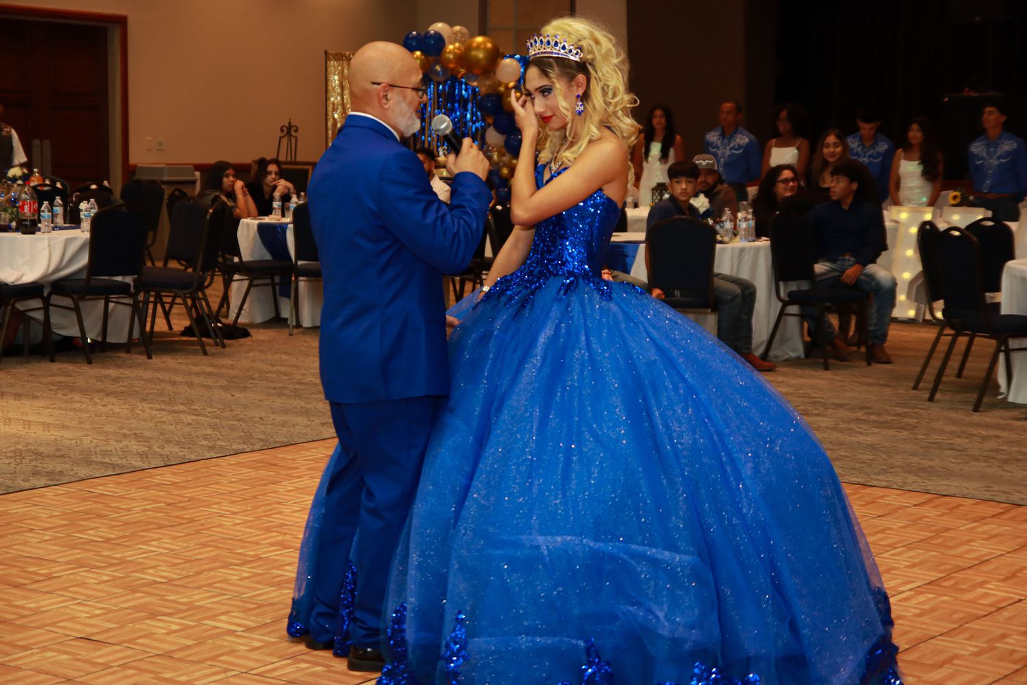 Quinceanera dancing with dad