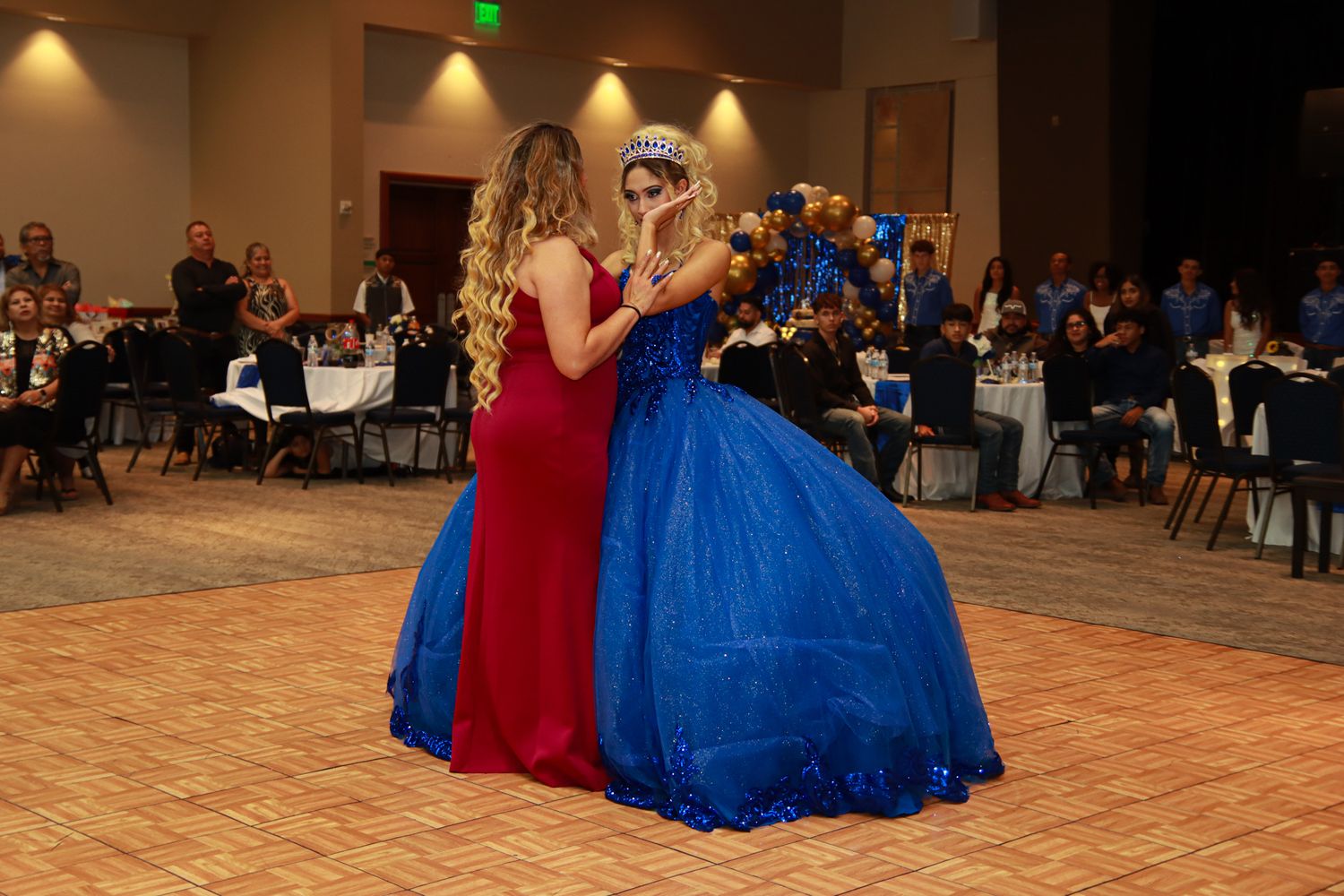 Quinceanera dancing with mom