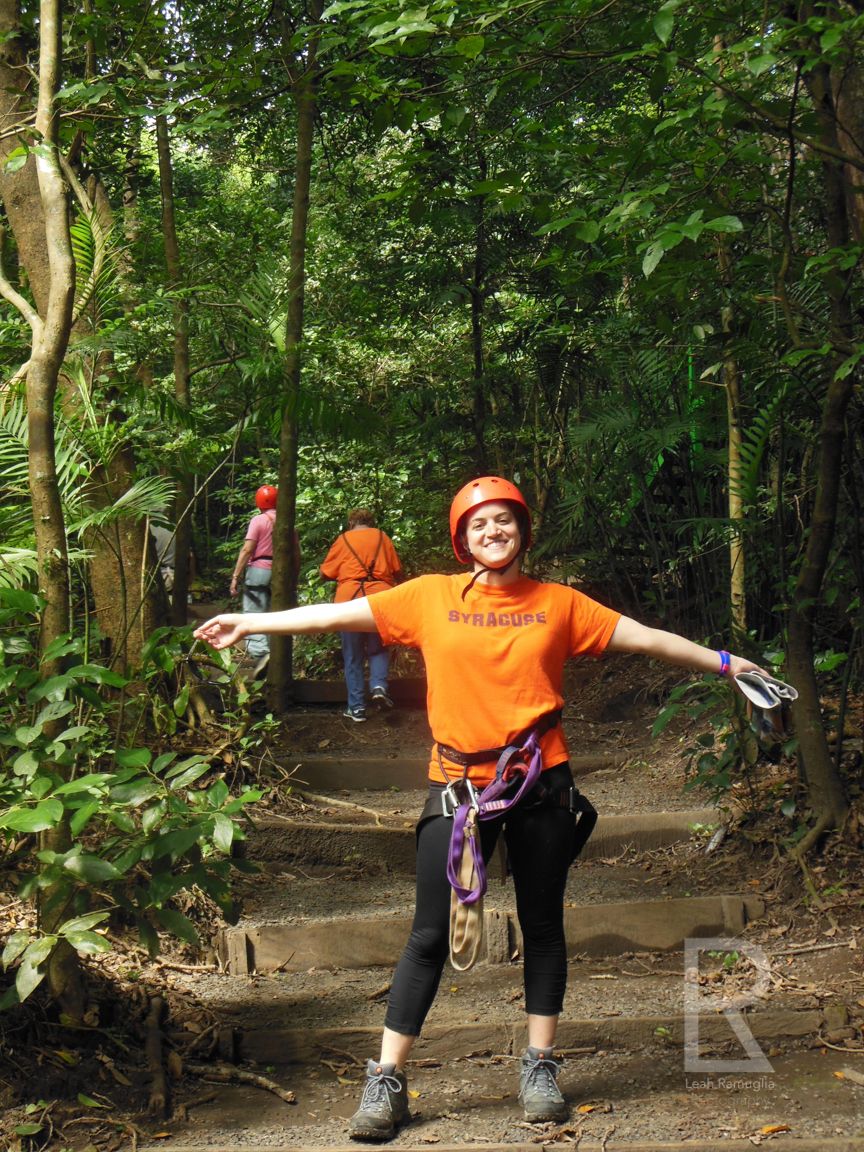 Leah Ramuglia ziplining in Guanacaste Costa Rica with a Syracuse University orange shirt
