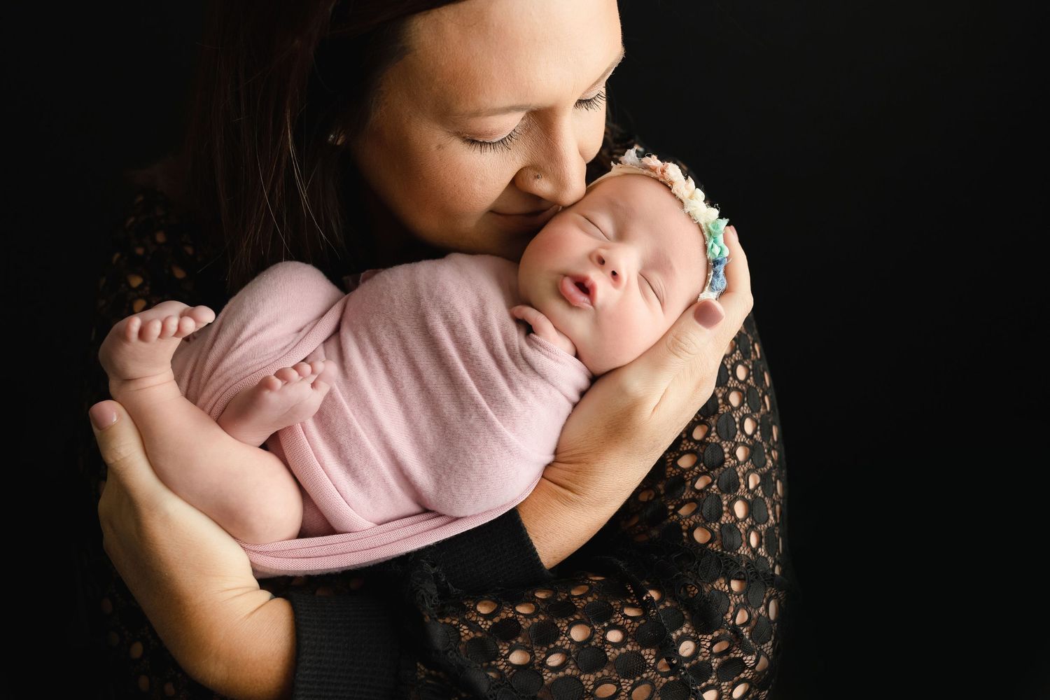A mom kissing newborn baby. Greenville SC newborn photographer, Easley, SC newborn photographer, Upstate SC newborn