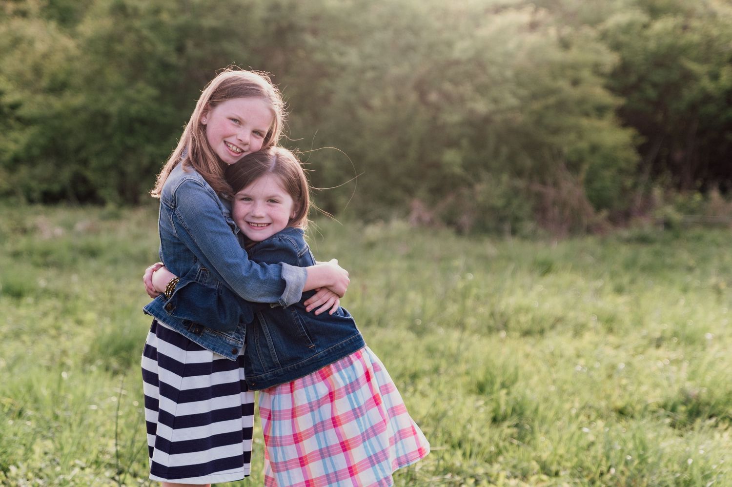 sisters hugging french park