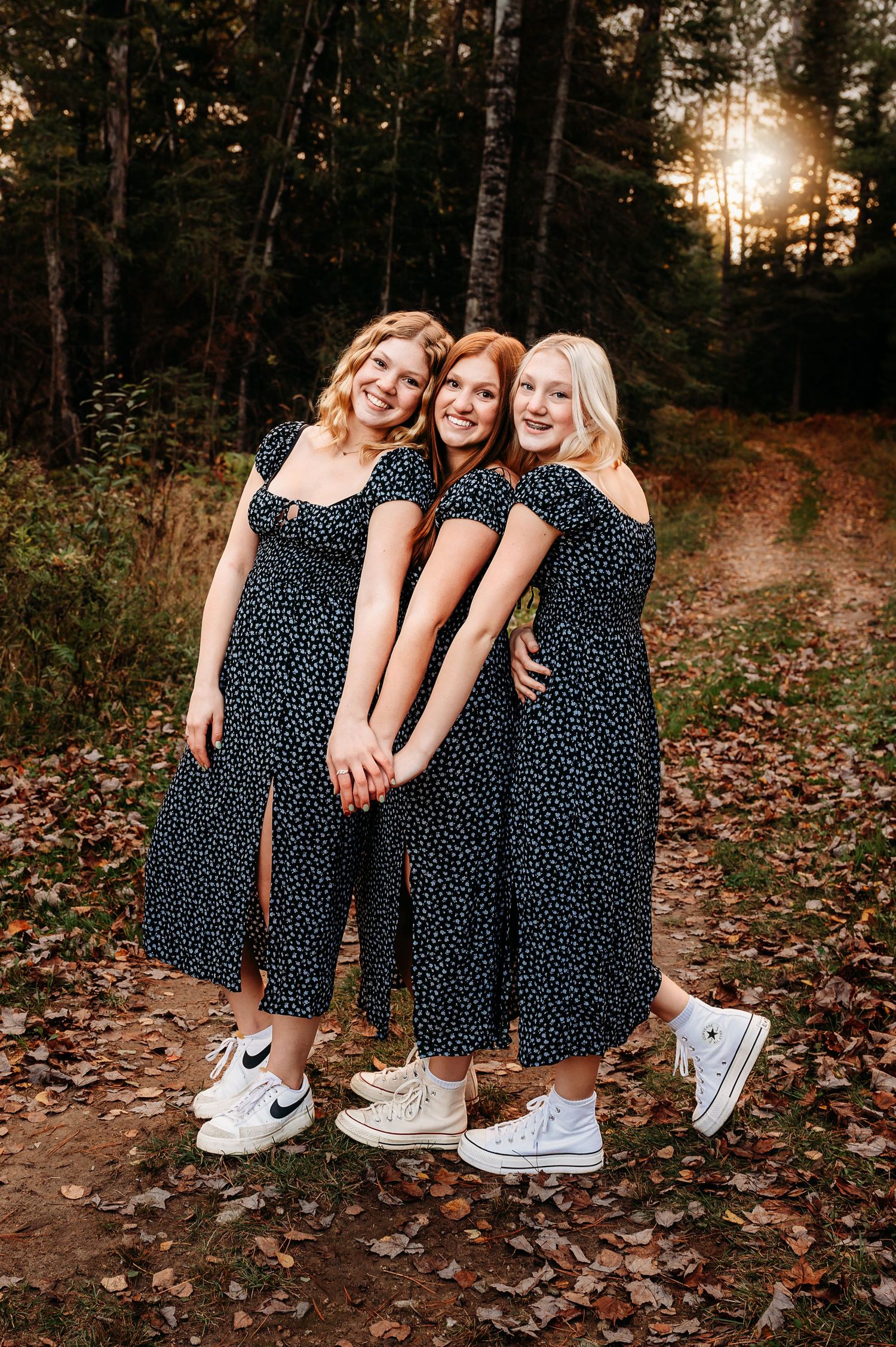 Three teen girls posing for kids photo session in Orr, Minnesota.