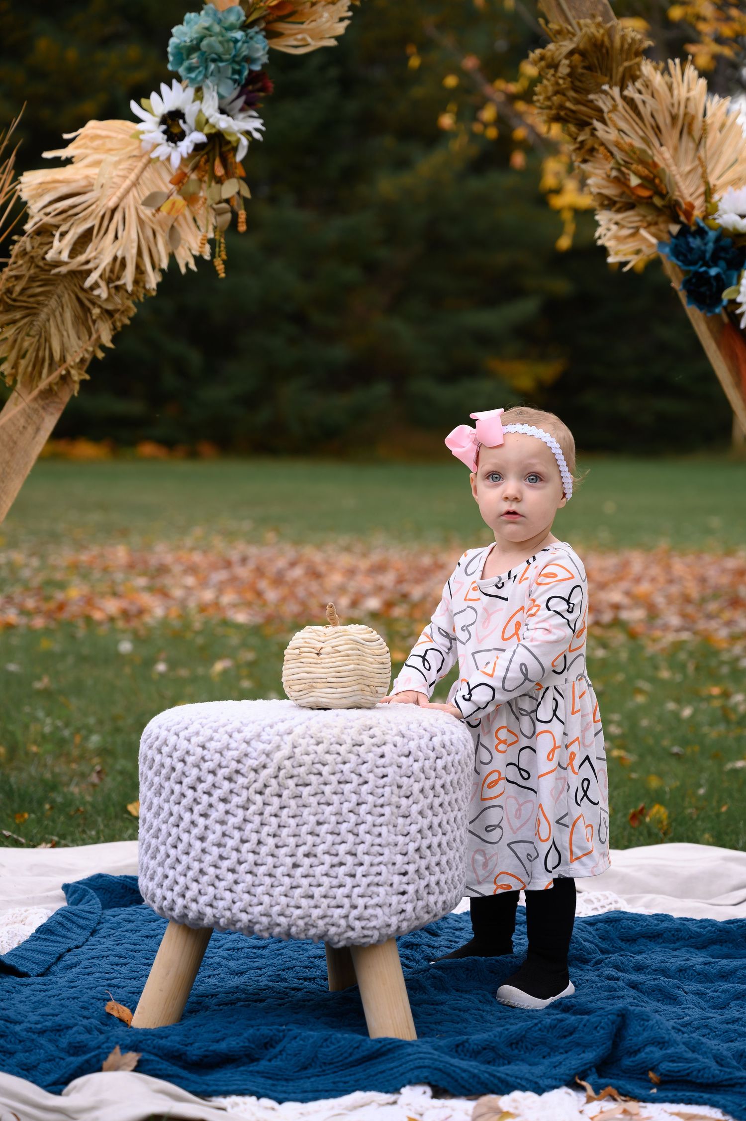 Young girl poses for kids session in Orr, Minnesota.