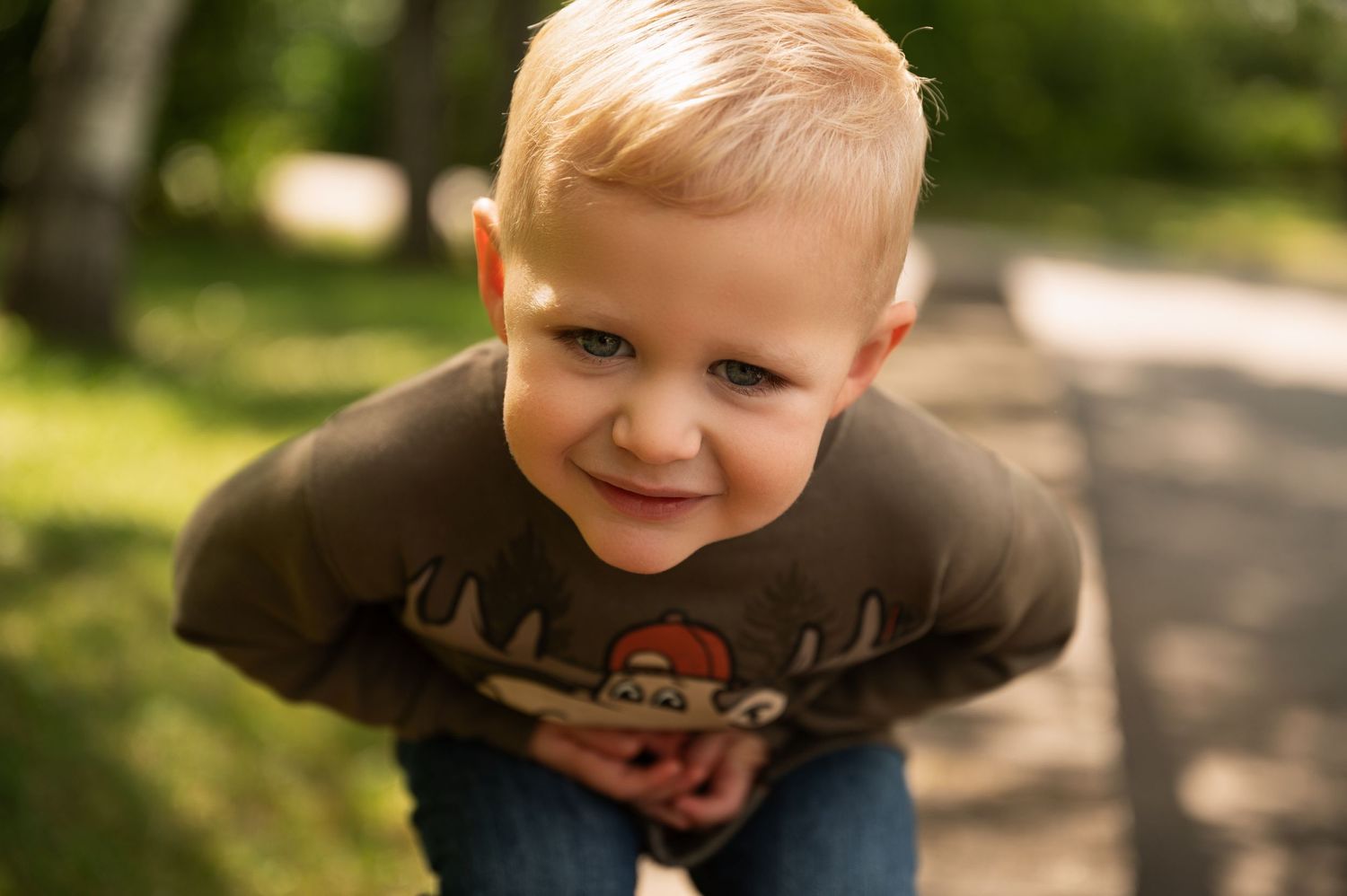 Young boy posing for kids session in Orr, Minnesota.
