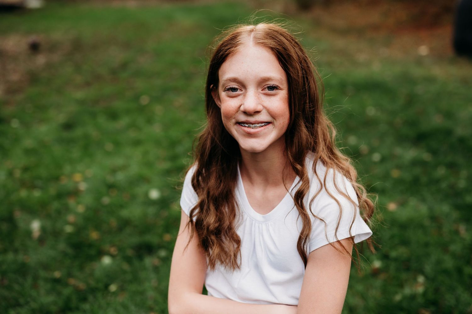 Young girl poses for summer scene in Orr, Minnesota.