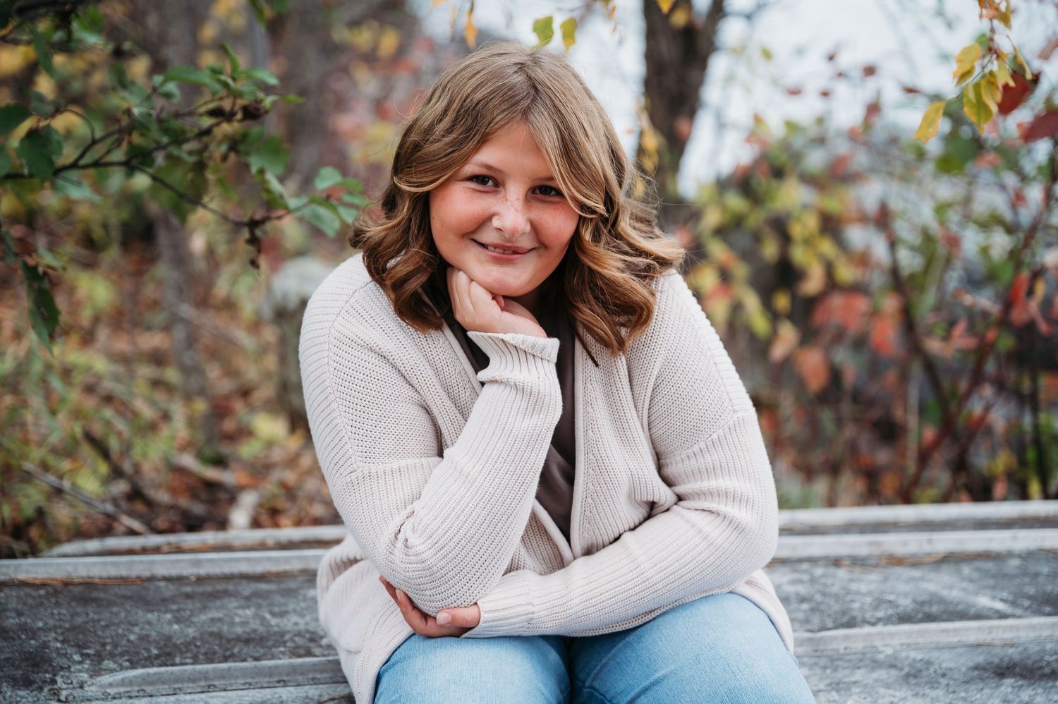 Young girl posing for kids photosession in Orr, Minnesota.