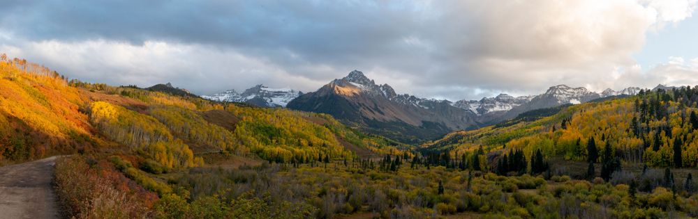 Colorado fall colors sunset panorama of Mount Sneffels mountain range and aspen